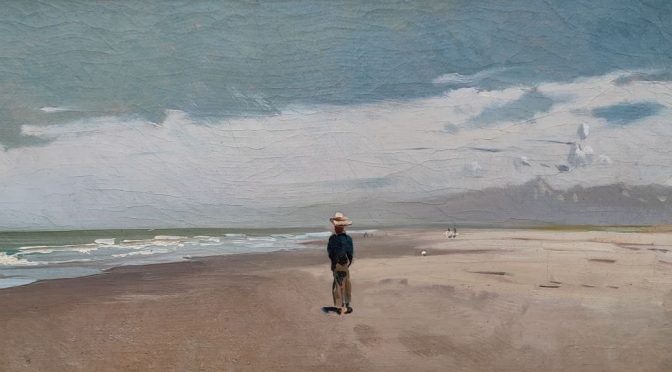 Uomo solitario in spiaggia